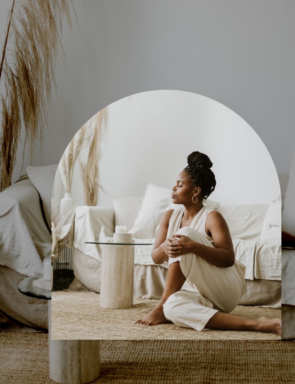 Woman is meditating in her home as part of her daily wellness rituals.